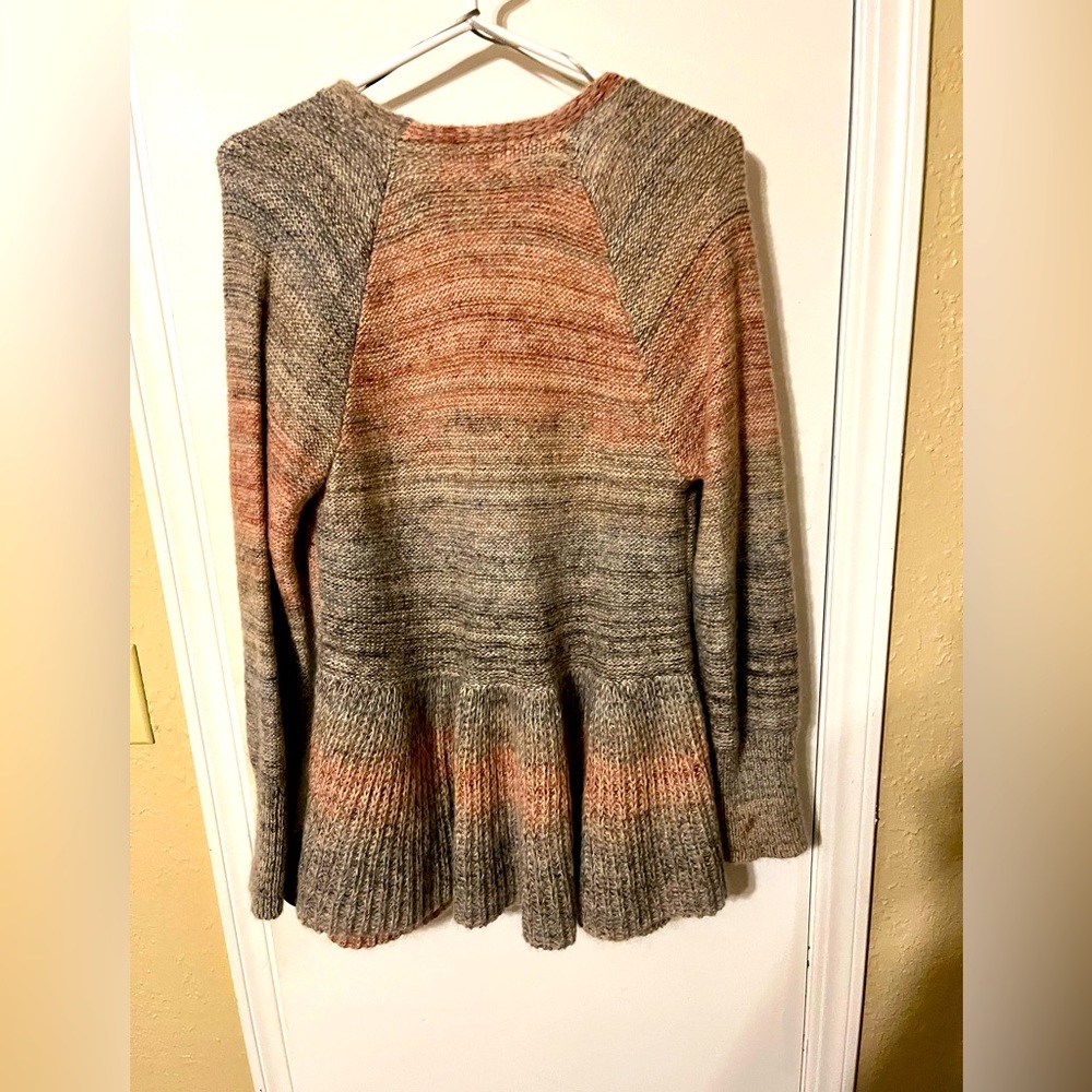 Warm knit cardigan with peplum